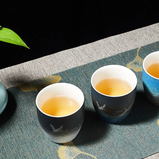 four deer motif tea cups arranged together full set view