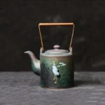 full view of 180ml vintage crane pattern ceramic teapot with infuser