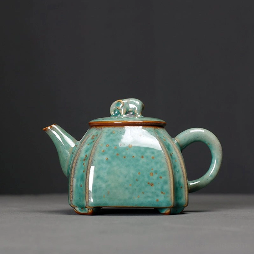 full view of 250ml green elephant knob ceramic teapot with infuser