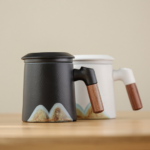full product view of mountain ceramic tea infuser mug with wood handle and lid 380ml