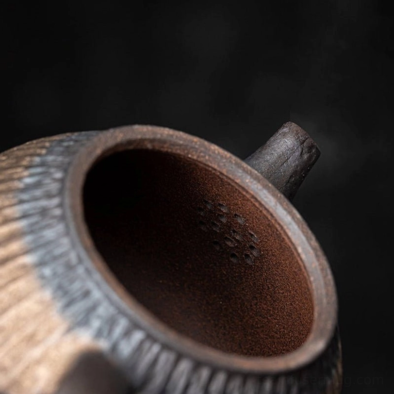 bottom maker mark detail of gilded iron glaze ceramic teapot