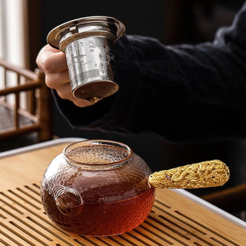 spout detail of glass kyusu teapot showing clean pour design