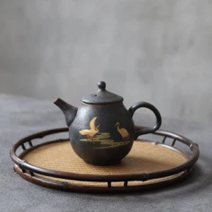 full view of golden crane design black ceramic teapot with infuser 230ml