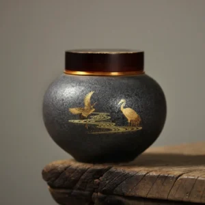 Full view of golden crane design ceramic airtight tea storage canister