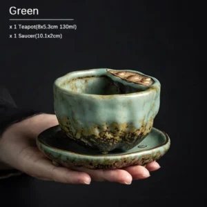 green lotus shaped chinese ceramic teapot with matching saucer