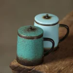 full view of 13oz green vintage ceramic tea infuser mug with strainer and lid