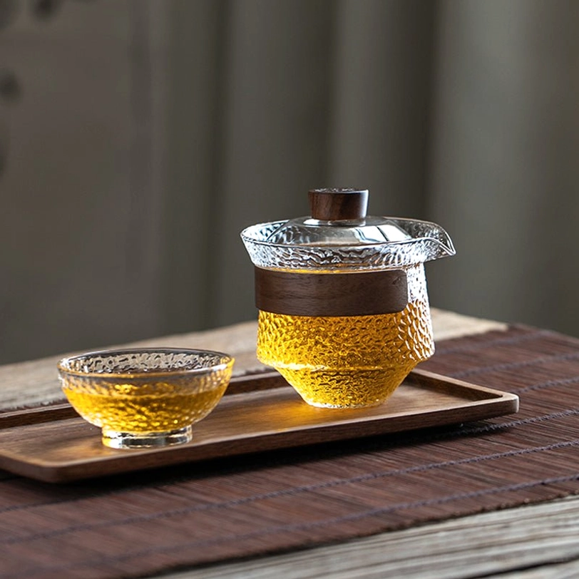 close up of textured hammered glass surface on gaiwan tea cup