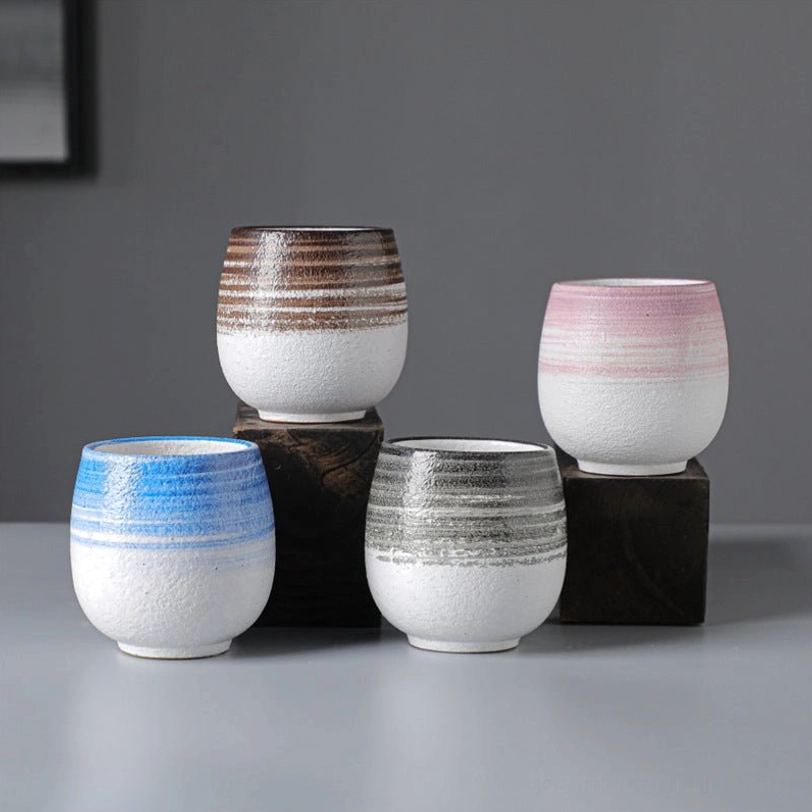 full collection of four rustic japanese style ceramic tea cups