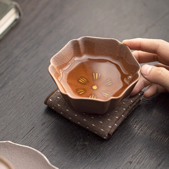 close up of petal edge of japanese clay tea cup