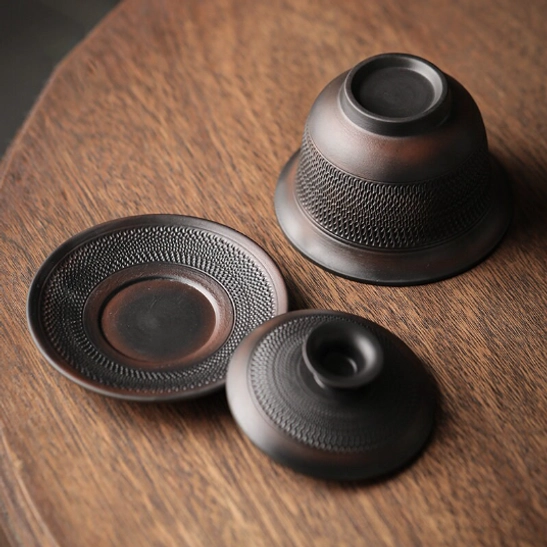 Side view of textured Japanese vintage gaiwan tea cup