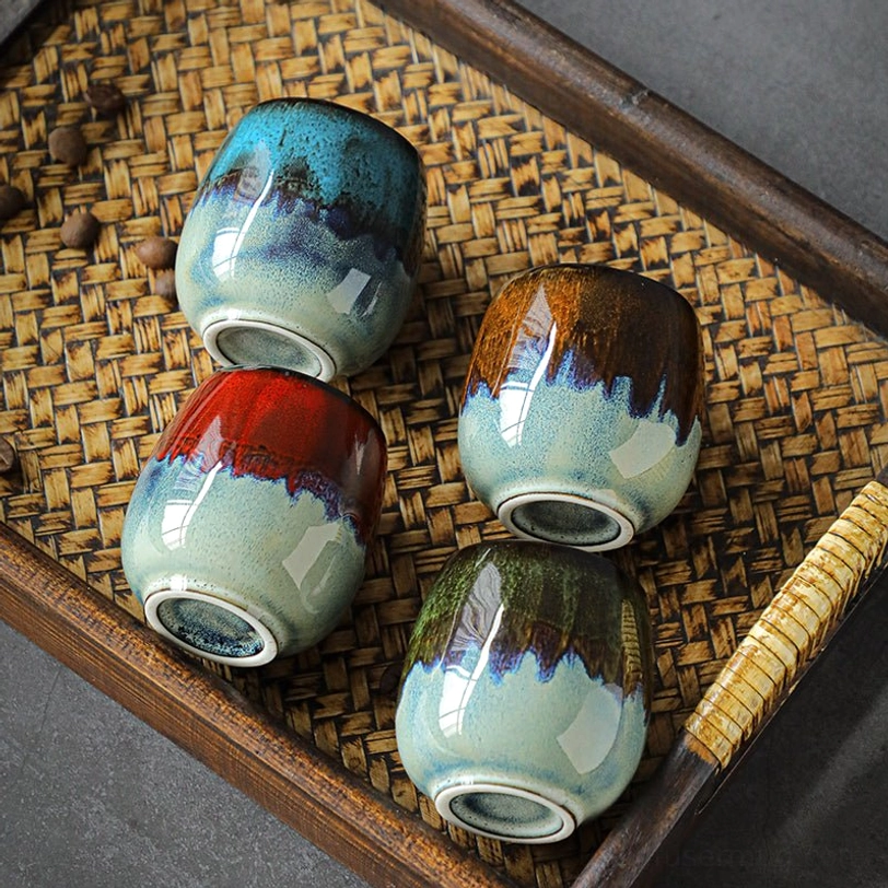 jian zhan coffee cup filled with latte with art