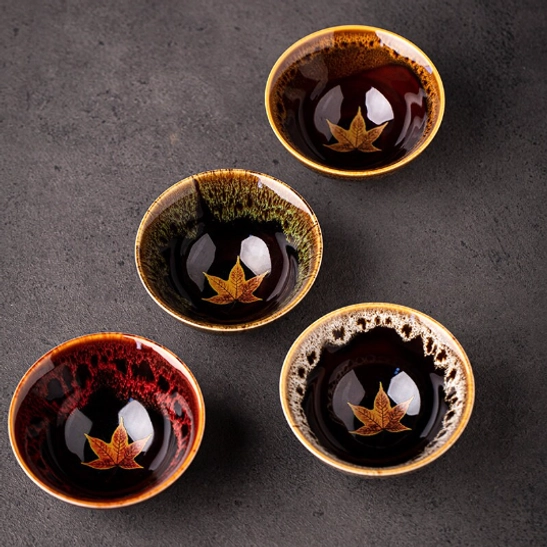 multiple jian zhan maple tea cup variants displayed together