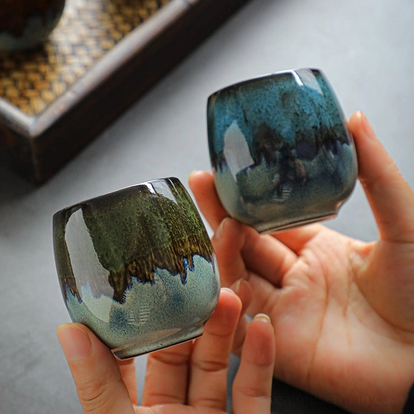 close up of kiln change glaze on jian zhan tea cup