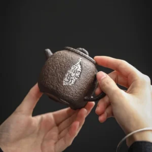 jingdezhen 200ml coarse pottery teapot with 999 silver accent full product view