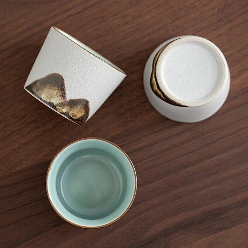 Close up of Chinese landscape pattern on ceramic travel tea set teapot