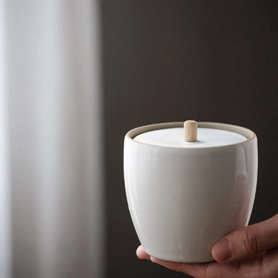 large size white ceramic tea storage jar with wood handle