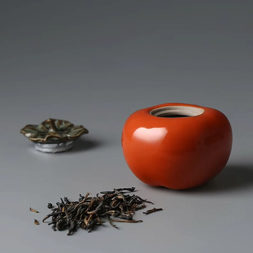 close up of lid detail on mini persimmon ceramic tea storage canister