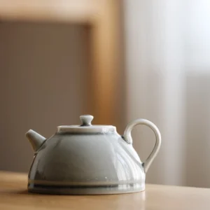 full product view of 200ml light gray ceramic teapot with built-in filter