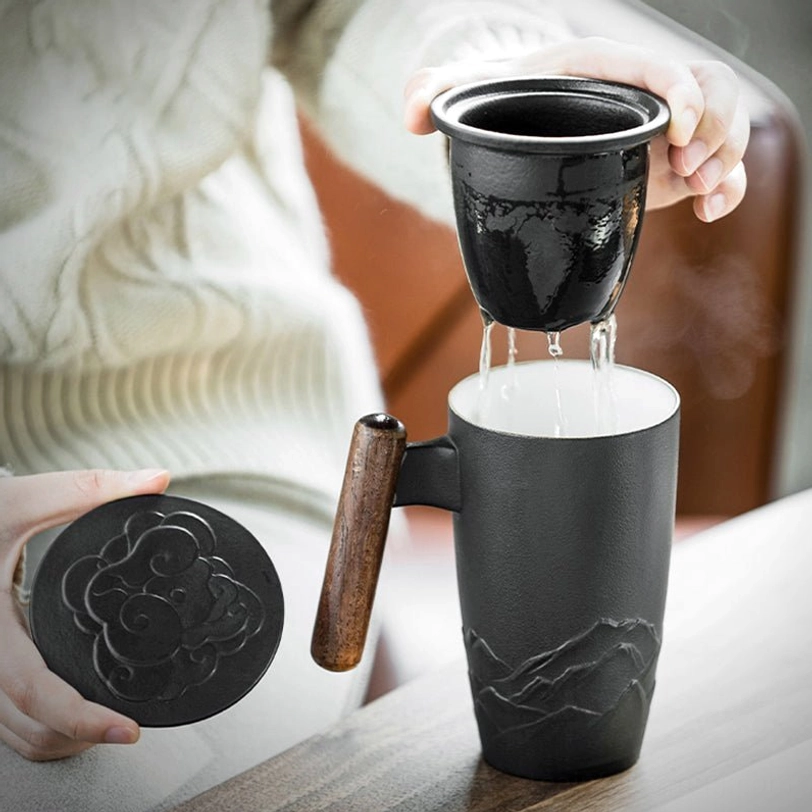 loose leaf tea steeping in ceramic tea infuser mug