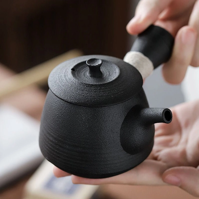 front view of matte black kyusu teapot with built-in infuser 175ml