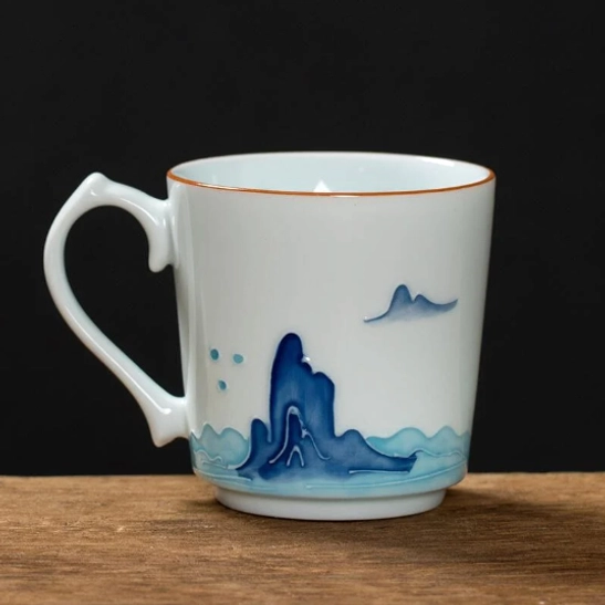 Mountain motif modern Chinese tea cup side view