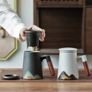 14oz ceramic mountain infuser tea mug with lid and wooden handle, both color variants displayed
