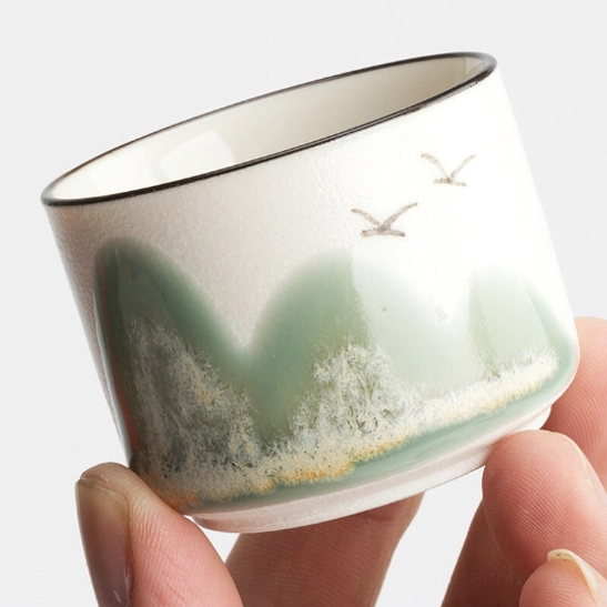 Multi-colored 70ml mountain design Chinese tea cups arranged together