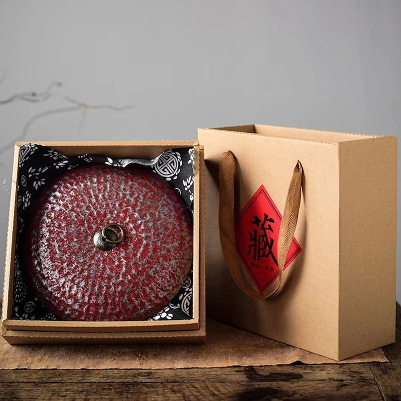 ceramic tea storage canister used as tea tray on traditional tea table