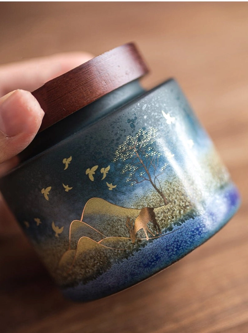 multiple decorative chinese tea storage canisters on display