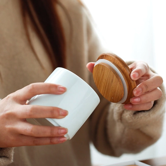 Lid removed from ceramic tea storage jar showing opening