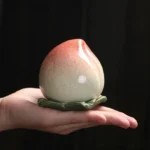 peach shape ceramic tea storage jar full view