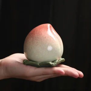 peach shape ceramic tea storage jar full view