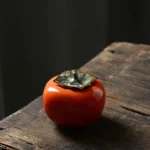 Persimmon shaped ceramic tea storage canister full product view
