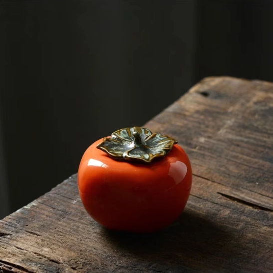 Persimmon shaped ceramic tea storage canister full product view