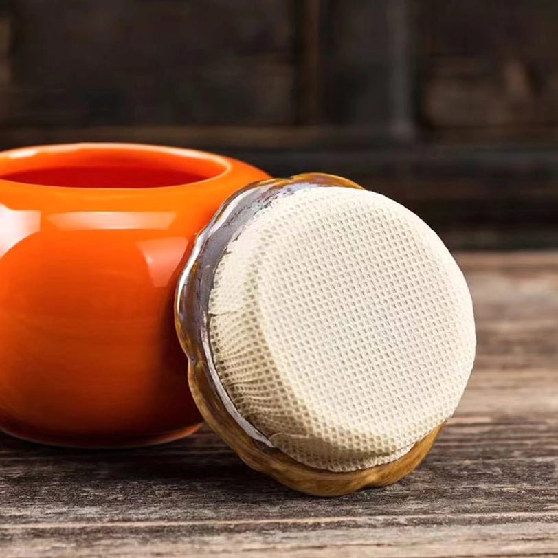 underside view of lid showing fabric seal for tea storage caddy