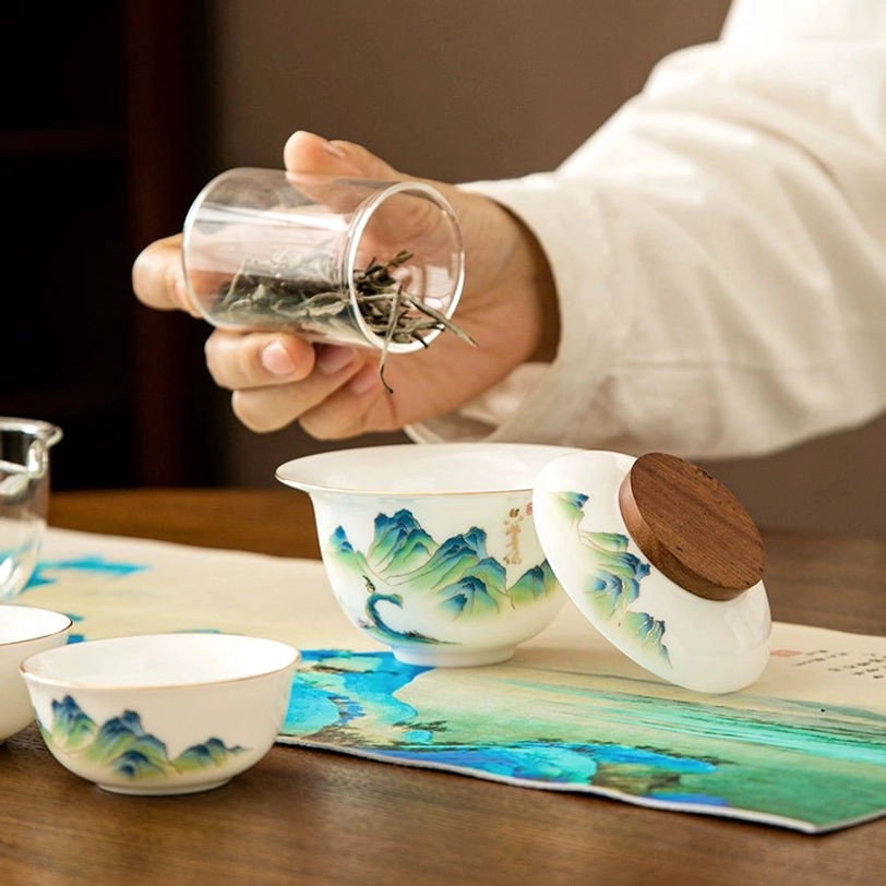 small porcelain tea caddy with wooden lid for travel tea set