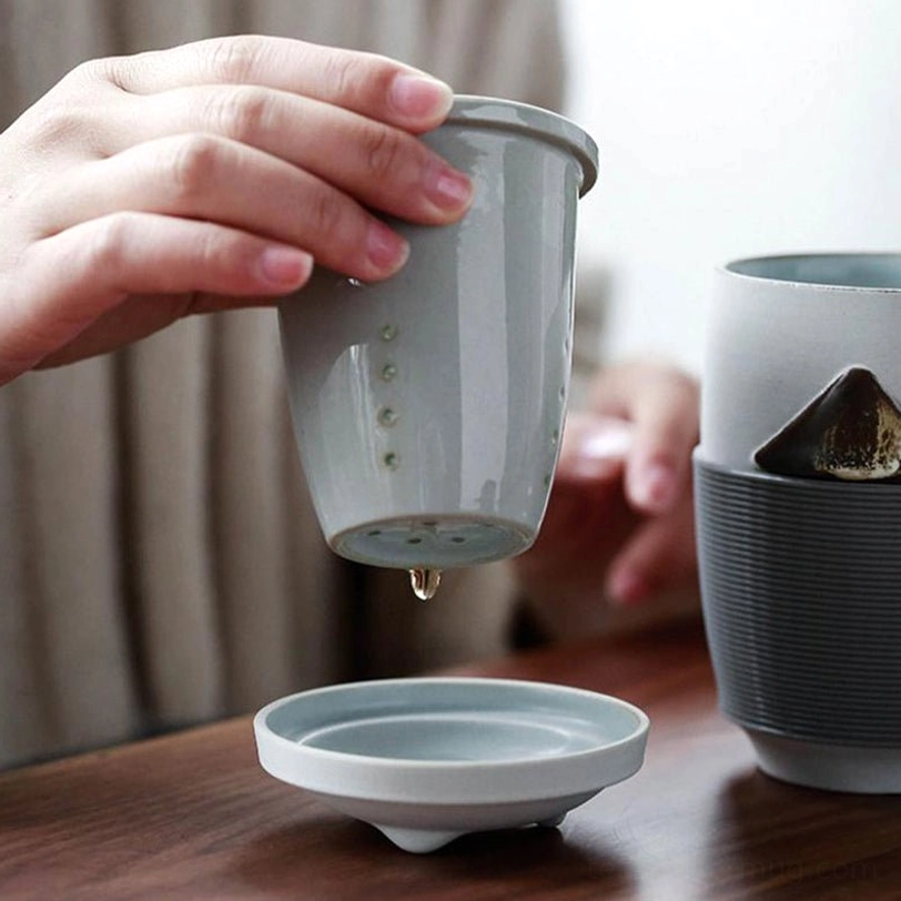 portable mountain tea infuser mug packed inside included travel pouch