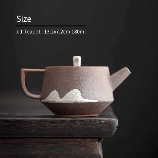 pouring hot water into faraway mountain ceramic teapot for brewing