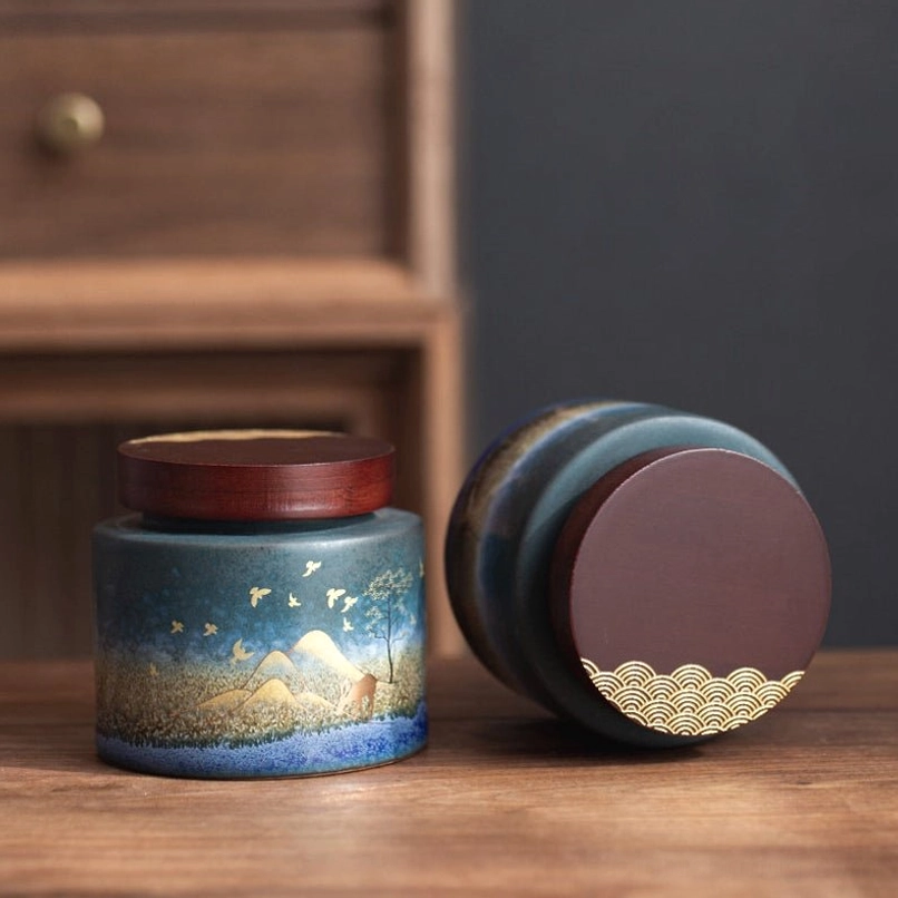 pouring loose tea from ceramic tea storage canister into tea pot