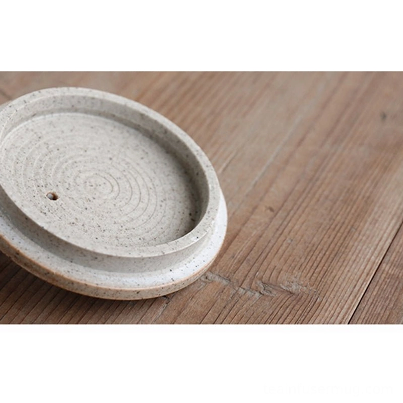 profile view of 220ml side handle ceramic teapot with infuser