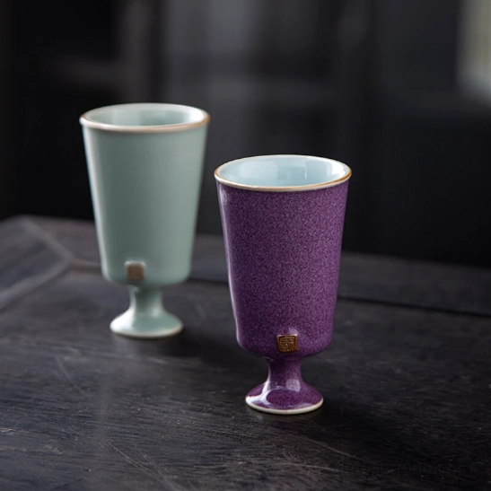 Purple variant Chinese high foot tea cup with textured glaze