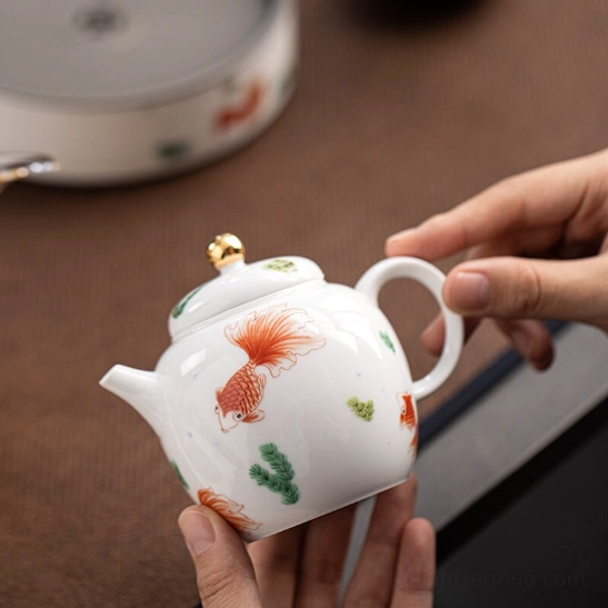 red koi fish pattern on white ceramic teapot