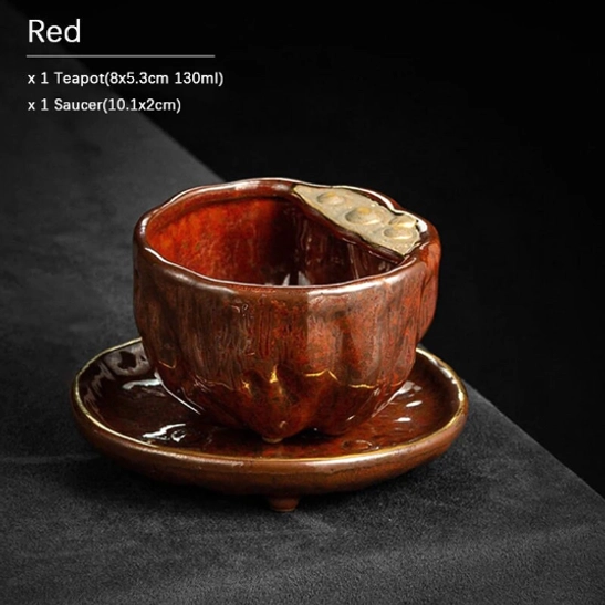 red lotus shaped chinese ceramic teapot with matching saucer