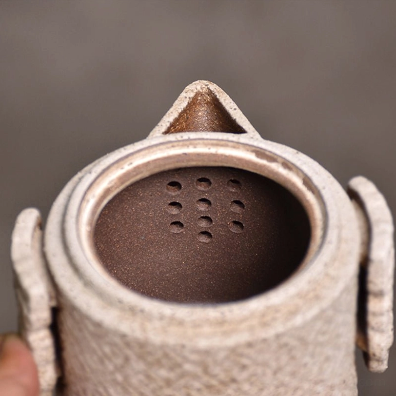 retro embossed geometric pattern on travel tea set