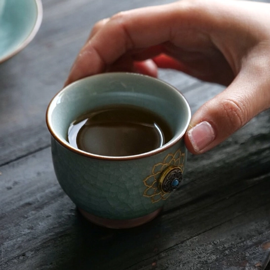 ru kiln lotus chinese tea cup with tea brewing setup