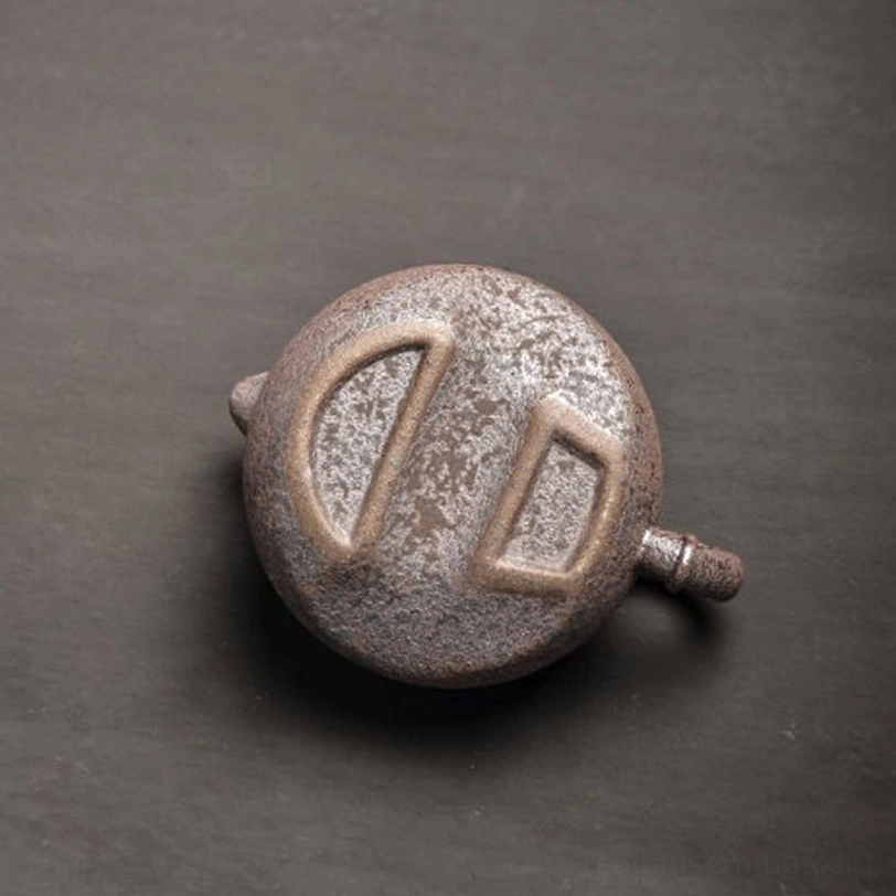 handle detail of 220ml rust glaze ceramic teapot with infuser