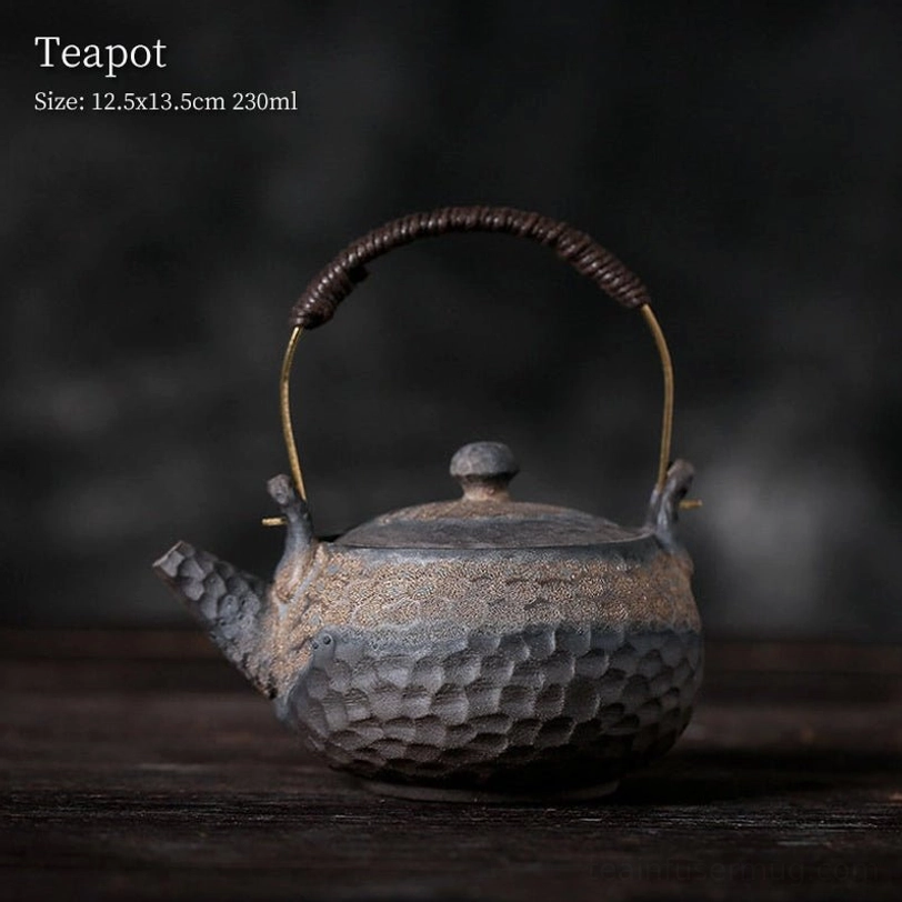 side view of rustic hammered texture ceramic teapot with built-in infuser