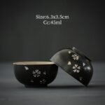 set of 2 black antique japanese tea bowls with silver sakura pattern