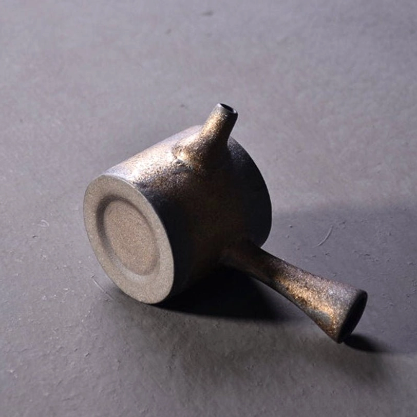 profile view of side handle of japanese style kyusu teapot