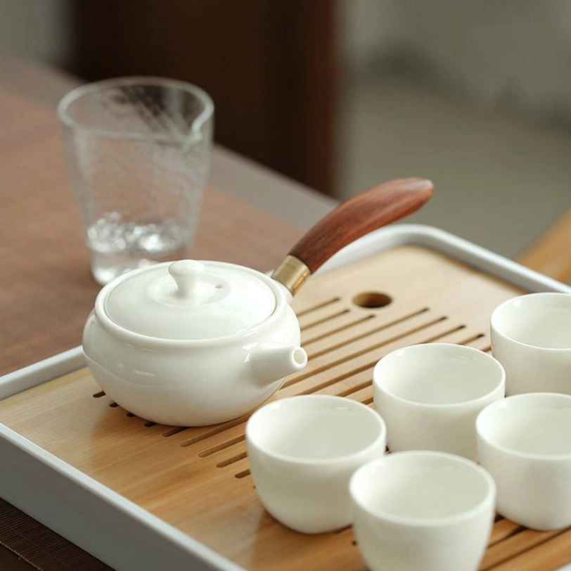 180ml white porcelain kyusu teapot side handle view showing ergonomic grip